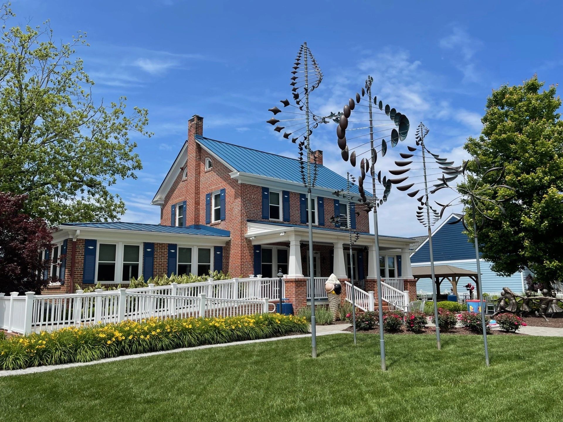 Restored brick farmhouse with wraparound porch