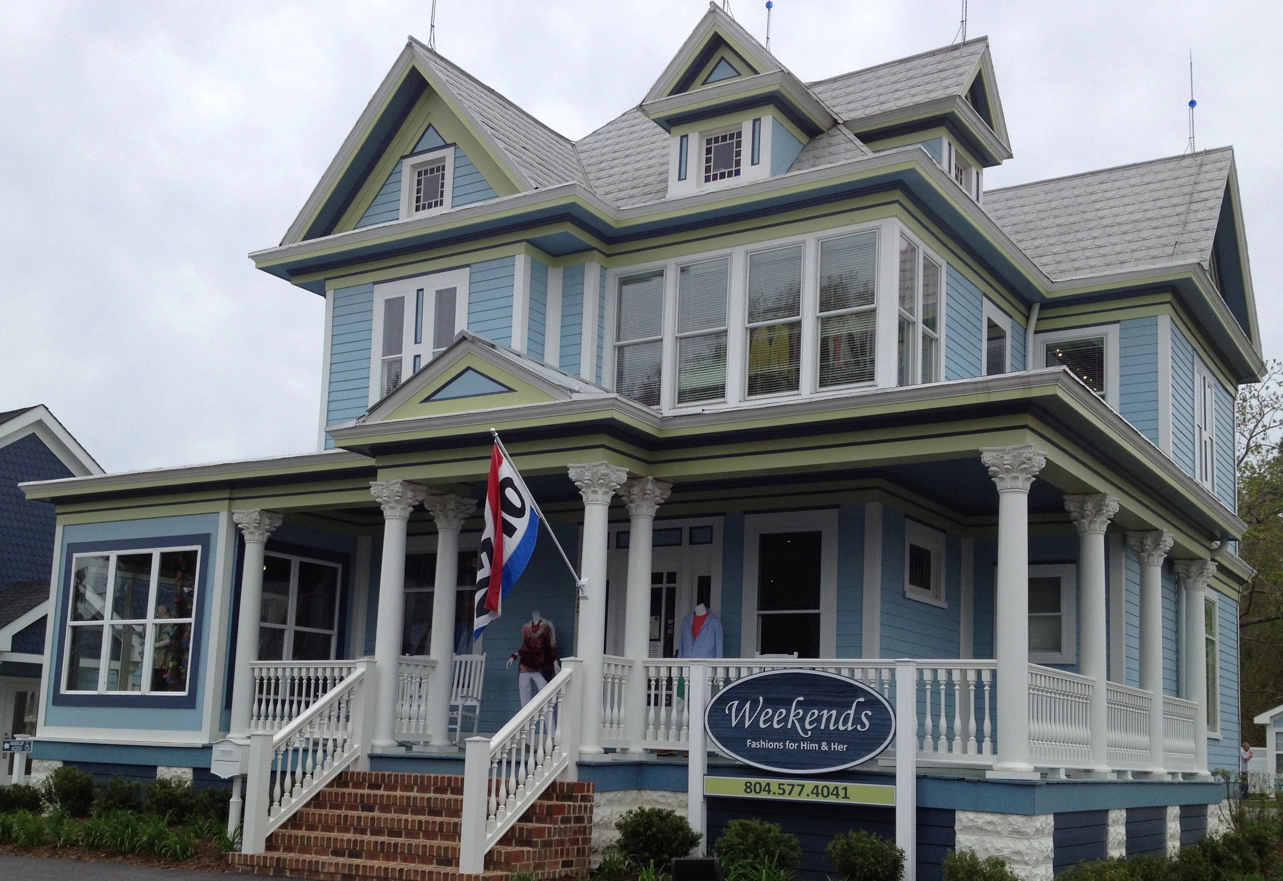 Victorian house with wraparound porch housing retail boutique